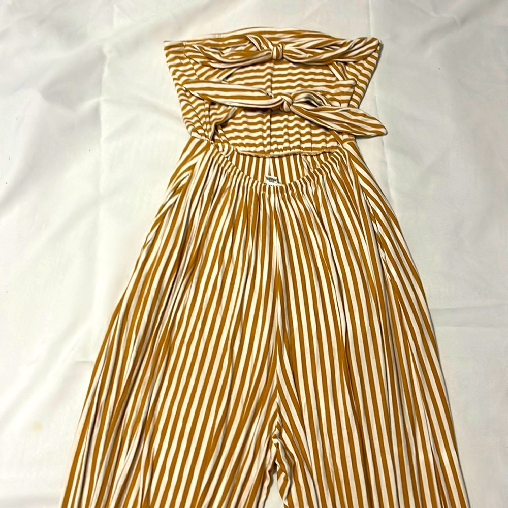Striped summer romper! Cute back detail! Wide leg pant…